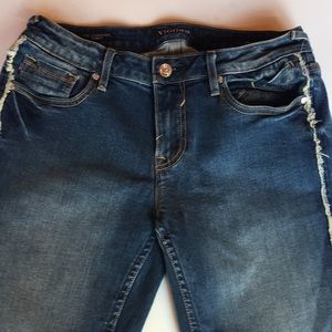 Skinny jeans by Vigoss w/ fringe piping down legs